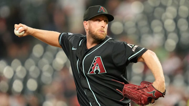 Apr 14, 2026; Baltimore, Maryland, USA; Arizona Diamondbacks pitcher Merrill Kelly (29) delivers during the fourth inning against the Baltimore Orioles at Oriole Park at Camden Yards. Mandatory Credit: Mitch Stringer-Imagn Images