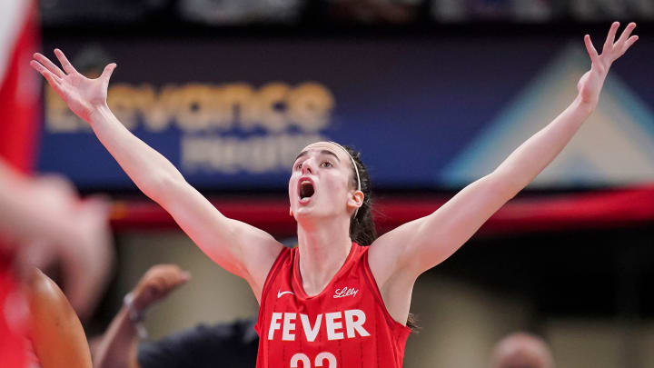 Indiana Fever guard Caitlin Clark (22) yells to the referee Thursday, June 13, 2024, during the game at Gainbridge Fieldhouse in Indianapolis. The Indiana Fever defeated the Atlanta Dream, 91-84.