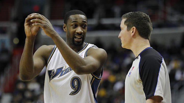 December 14, 2010; Washington, DC, USA; Washington Wizards point guard Gilbert Arenas (9) talks to an official against the Los Angeles Lakers at Verizon Center. Mandatory Credit: Geoff Burke-Imagn Images