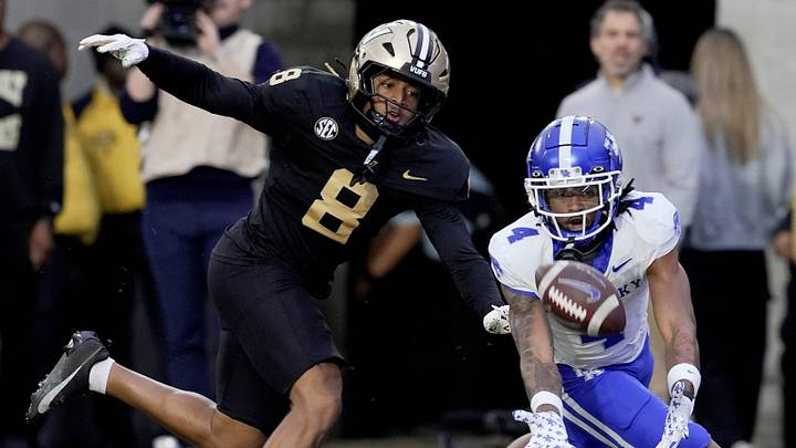 Vanderbilt safety CJ Heard (8) stops Kentucky wide receiver J.J. Hester (4) from catching a pass in the end zone during the second quarter at FirstBank Stadium in Nashville, Tenn., Saturday, Nov. 22, 2025.