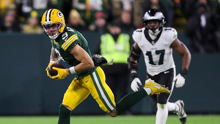 Green Bay Packers wide receiver Christian Watson (9) turns upfield after catching a pass against the Philadelphia Eagles on Monday, November 10, 2025, at Lambeau Field in Green Bay, Wis. The Eagles won the game, 10-7.