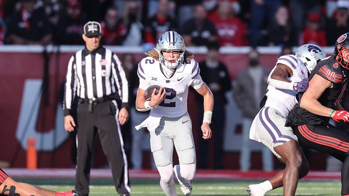 Nov 22, 2025; Salt Lake City, Utah, USA; Kansas State Wildcats quarterback Avery Johnson (2) runs the ball against the Utah Utes during the first half at Rice-Eccles Stadium. Mandatory Credit: Rob Gray-Imagn Images Nov 22, 2025; Salt Lake City, Utah, USA; Kansas State Wildcats quarterback Avery Johnson (2) runs the ball against the Utah Utes during the first half at Rice-Eccles Stadium. Mandatory Credit: Rob Gray-Imagn Images