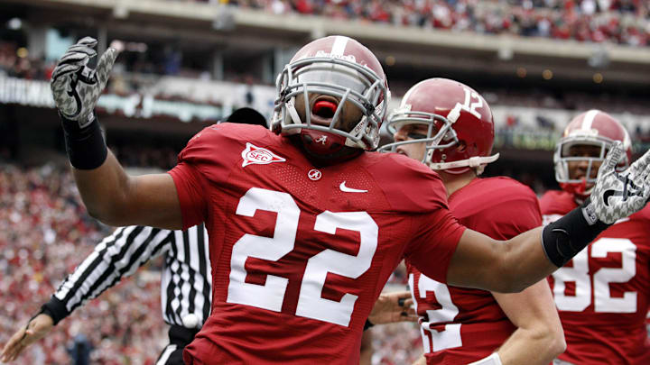 Nov 26, 2010; Tuscaloosa, AL, USA; Alabama Crimson Tide running  back Mark Ingram (22) celebrates a touchdown against the Auburn Tigers during the first half at Bryant-Denny Stadium. Mandatory Credit: John Reed-Imagn Images