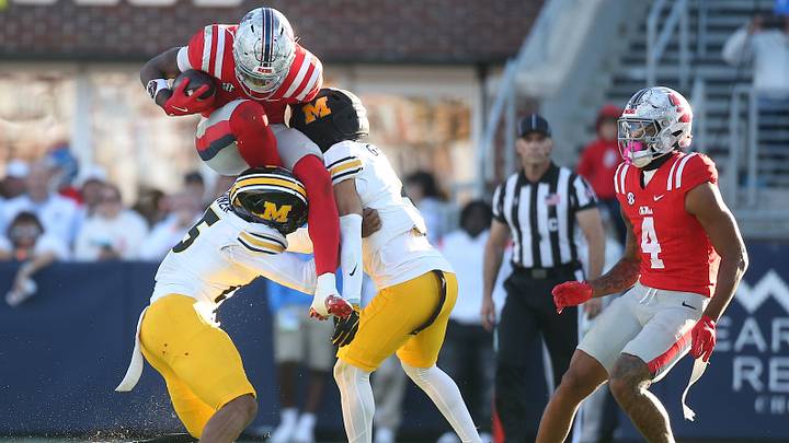 Oct 17, 2026; Oxford, Mississippi, USA; at Vaught-Hemingway Stadium.Mississippi Rebels running back Kewan Lacy (5)is tackled by Missouri Tigers safety Santana Banner (15) and safety Trajen Greco (4) at Vaught-Hemingway Stadium. Mandatory Credit: Petre Thomas-Imagn Images Oct 17, 2026; Oxford, Mississippi, USA; at Vaught-Hemingway Stadium.Mississippi Rebels running back Kewan Lacy (5)is tackled by Missouri Tigers safety Santana Banner (15) and safety Trajen Greco (4) at Vaught-Hemingway Stadium. Mandatory Credit: Petre Thomas-Imagn Images