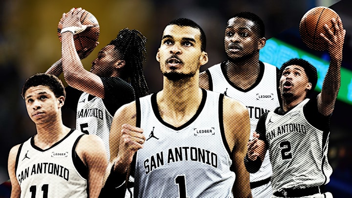 San Antonio Spurs forward Victor Wembanyama (1), point guard Dylan Harper (2), point guard De'Aaron Fox (4), guard Stephon Castle (5) and forward Carter Bryant (11).