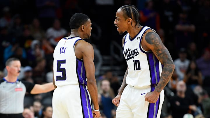 De'Mar DeRozan, De'Aaron Fox of the Sacramento Kings v Phoenix Suns