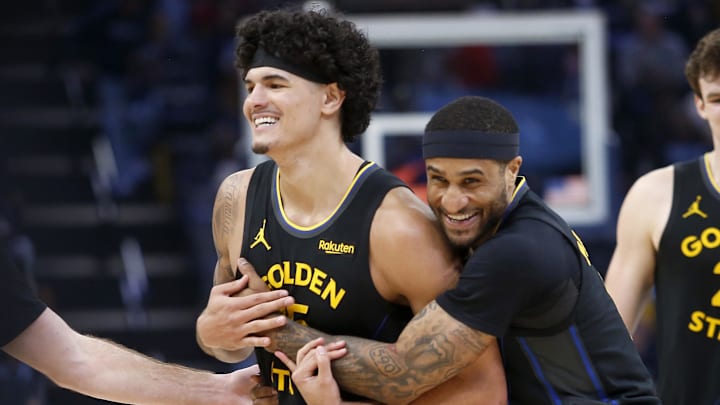 Feb 25, 2026; Memphis, Tennessee, USA; Golden State Warriors guard Gary Payton II (0) embraces with forward Gui Santos (15) during the second half against the Memphis Grizzlies at FedExForum. Mandatory Credit: Petre Thomas-Imagn Images