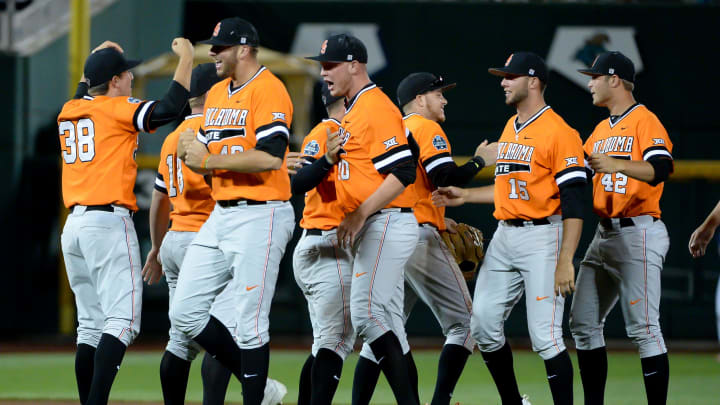 Jun 20, 2016; Omaha, NE, USA; The Oklahoma State Cowboys celebrate the win against the Arizona Wildcats in the 2016 College World Series at TD Ameritrade Park. Oklahoma State defeated Arizona 1-0. Mandatory Credit: Steven Branscombe-USA TODAY Sports Jun 20, 2016; Omaha, NE, USA; The Oklahoma State Cowboys celebrate the win against the Arizona Wildcats in the 2016 College World Series at TD Ameritrade Park. Oklahoma State defeated Arizona 1-0. Mandatory Credit: Steven Branscombe-USA TODAY Sports