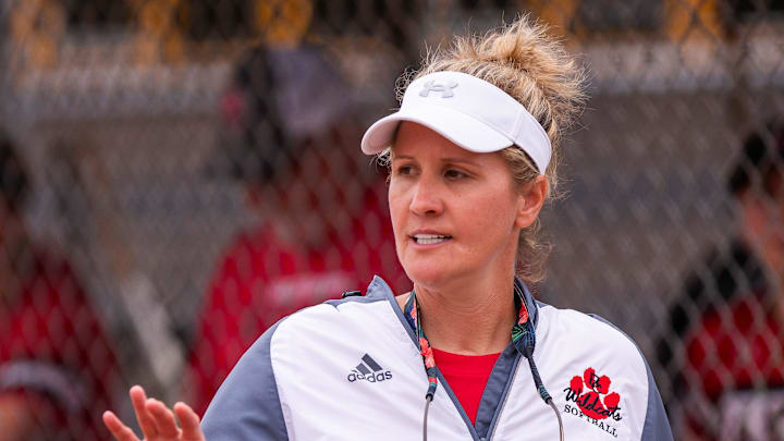 Baker County Wildcats head coach Kylee Canaday coaches during the fourth inning. The Baker County Wildcats (11-2-1) played at Paxon Eagles (10-2), Monday night, March 31, 2025. Baker County defeated Paxon 4-0. [Doug Engle/Florida Times-Union]2025
