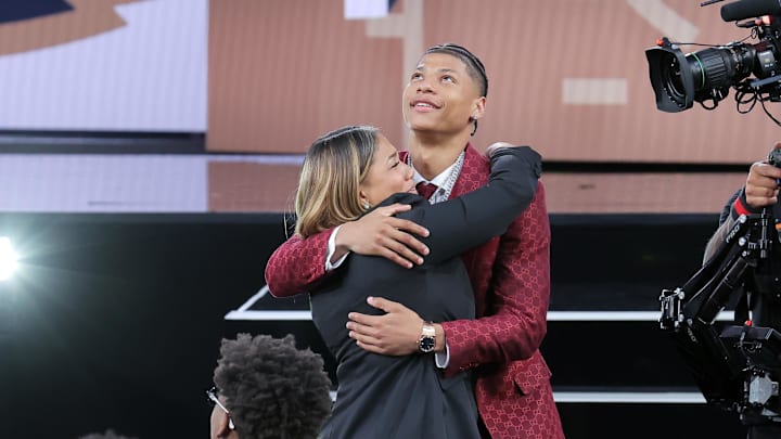 Jun 25, 2025; Brooklyn, NY, USA; Jeremiah Fears celebrates with family after being selected as the seventh pick by the New Orleans Pelicans in the first round of the 2025 NBA Draft at Barclays Center. Mandatory Credit: Brad Penner-Imagn Images Jun 25, 2025; Brooklyn, NY, USA; Jeremiah Fears celebrates with family after being selected as the seventh pick by the New Orleans Pelicans in the first round of the 2025 NBA Draft at Barclays Center. Mandatory Credit: Brad Penner-Imagn Images