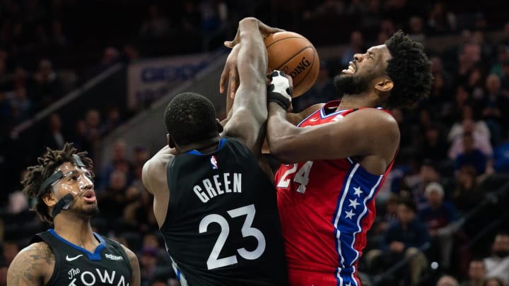 Jan 28, 2020; Philadelphia, Pennsylvania, USA; Philadelphia 76ers center Joel Embiid (24) and Golden