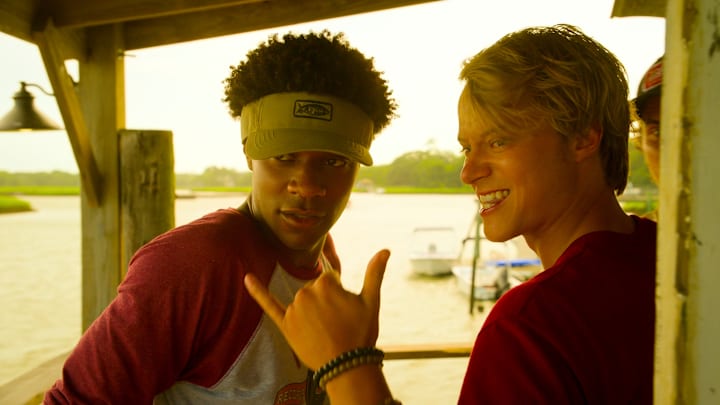 Outer Banks. (L to R) Jonathan Daviss as Pope, Rudy Pankow as JJ in episode 401 of Outer Banks. Cr. Courtesy of Netflix © 2024