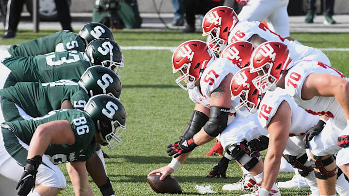 Nov 14, 2020; East Lansing, Michigan, USA; Indiana Hoosiers offensive line lines up against us Michigan State Spartans defensive line during the first quarter at Spartan Stadium. Mandatory Credit: Tim Fuller-Imagn Images