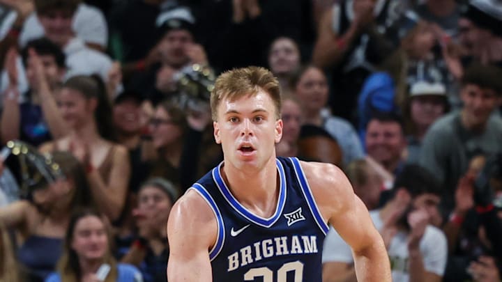 Jan 13, 2024; Orlando, Florida, USA; Brigham Young Cougars guard Dallin Hall (30) brings the ball up