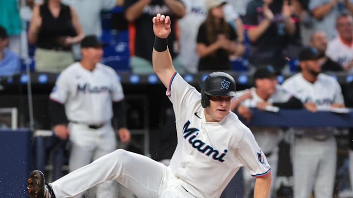 Mar 27, 2026; Miami, Florida, USA; Miami Marlins designated hitter Owen Caissie (17) scores against the Colorado Rockies during the second inning at loanDepot Park. Mandatory Credit: Sam Navarro-Imagn Images Mar 27, 2026; Miami, Florida, USA; Miami Marlins designated hitter Owen Caissie (17) scores against the Colorado Rockies during the second inning at loanDepot Park. Mandatory Credit: Sam Navarro-Imagn Images
