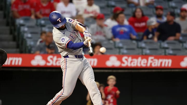 Texas Rangers second baseman Marcus Semien (2) hits a double during the first inning against the Los Angeles Angels at Angel Stadium on Sept 28.