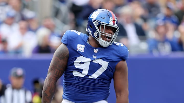 Oct 16, 2022; East Rutherford, New Jersey, USA; New York Giants defensive tackle Dexter Lawrence (97) celebrates a sack against the Baltimore Ravens during the second quarter at MetLife Stadium.  