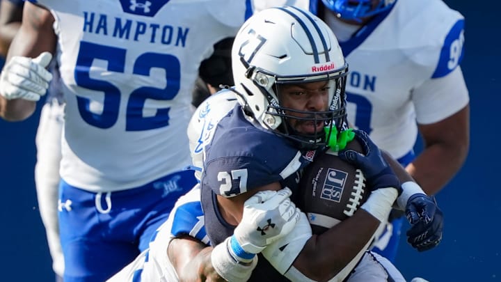 Jackson State Tigers' running back Ahmad Miller (27) runs the ball during the game against the Hampton Pirates at Mississippi Veterans Memorial Stadium in Jackson, Miss., on Saturday, Aug. 30, 2025.