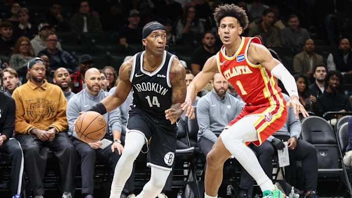 Oct 29, 2025; Brooklyn, New York, USA; Brooklyn Nets guard Terance Mann (14) looks to drive past Atlanta Hawks forward Jalen Johnson (1) in the first quarter at Barclays Center. Mandatory Credit: Wendell Cruz-Imagn Images Oct 29, 2025; Brooklyn, New York, USA; Brooklyn Nets guard Terance Mann (14) looks to drive past Atlanta Hawks forward Jalen Johnson (1) in the first quarter at Barclays Center. Mandatory Credit: Wendell Cruz-Imagn Images