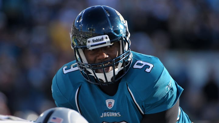 Dec 12, 2010; Jacksonville, FL, USA; Jacksonville Jaguars quarterback David Garrard (9) takes the snap during the game against the Oakland Raiders at EverBank Field. The Jaguars defeated the Raiders 38-31.  Mandatory Credit: Kirby Lee/Image of Sport-Imagn Images