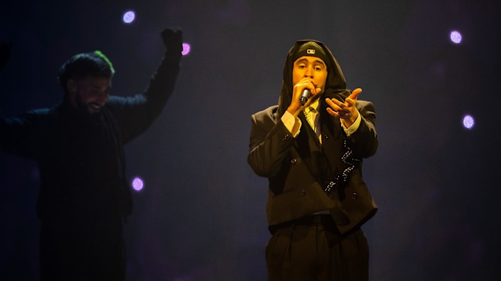 Bad Bunny performs onstage during his Most Wanted Tour at Little Caesars Arena in Detroit.