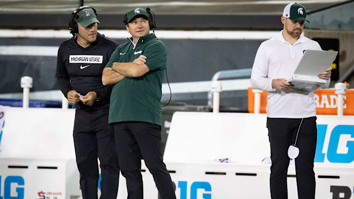Michigan State Spartans head coach Jonathan Smith looks toward the scoreboard during a timeout as the Ducks host the Spartans Friday, Oct. 4, 2024 at Autzen Stadium in Eugene, Ore.