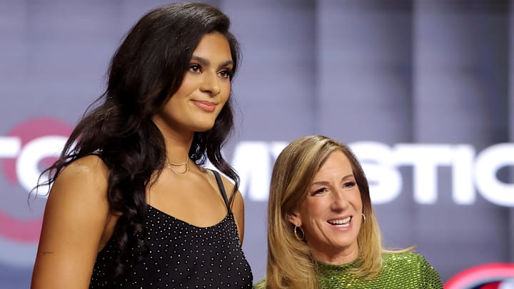 Apr 13, 2026; New York, NY, USA;  WNBA Commissioner Cathy Engelbert (right) poses for photos with Lauren Betts who was selected fourth overall by the Washington Mystics during the 2026 WNBA Draft at The Shed at Hudson Yards.