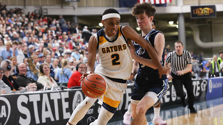 Annie Wright's Jeremiah Harshman drives to the hoop against Lynden Christian during the Class 1A state title game in the Yakima Valley SunDome.