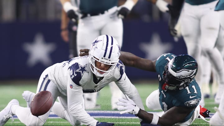 Dec 10, 2023; Arlington, Texas, USA; Philadelphia Eagles wide receiver A.J. Brown (11) fumbles the