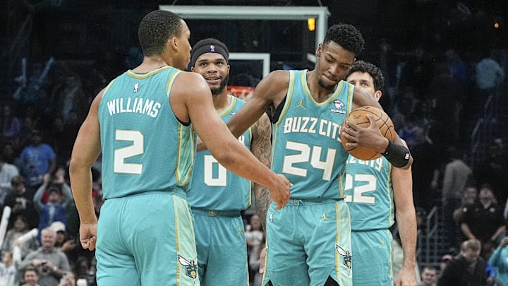 Mar 27, 2024; Charlotte, North Carolina, USA; Charlotte Hornets forward Grant Williams (2) congratulates forward Brandon Miller (24) during the second half against the Cleveland Cavaliers at Spectrum Center. Mandatory Credit: Jim Dedmon-Imagn Images Mar 27, 2024; Charlotte, North Carolina, USA; Charlotte Hornets forward Grant Williams (2) congratulates forward Brandon Miller (24) during the second half against the Cleveland Cavaliers at Spectrum Center. Mandatory Credit: Jim Dedmon-Imagn Images