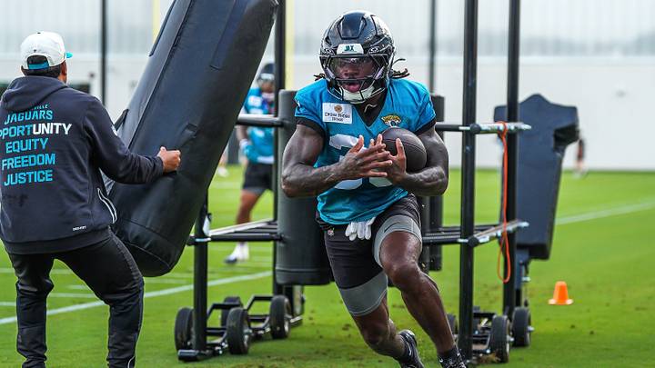 Jacksonville Jaguars Running Back J'Mari Taylor (30) carries the ball during a drill during the fourth day of NFL Training Camp in shells at the Miller Electric Center on Thursday, July 30, 2026, in Jacksonville, Fla.  [Doug Engle/Florida Times-Union]