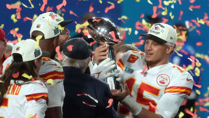Kansas City Chiefs quarterback Patrick Mahomes (15) holds the Lombardi Trophy after defeating the