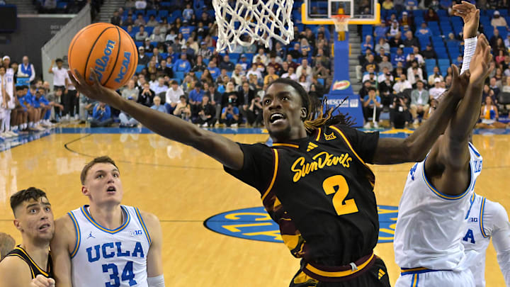 Dec 17, 2025; Los Angeles, California, USA; Arizona State Sun Devils guard Anthony Johnson (2) drives past UCLA Bruins guard Eric Dailey Jr. (3) for a basket in the second half at Pauley Pavilion presented by Wescom Financial. Mandatory Credit: Jayne Kamin-Oncea-Imagn Images Dec 17, 2025; Los Angeles, California, USA; Arizona State Sun Devils guard Anthony Johnson (2) drives past UCLA Bruins guard Eric Dailey Jr. (3) for a basket in the second half at Pauley Pavilion presented by Wescom Financial. Mandatory Credit: Jayne Kamin-Oncea-Imagn Images