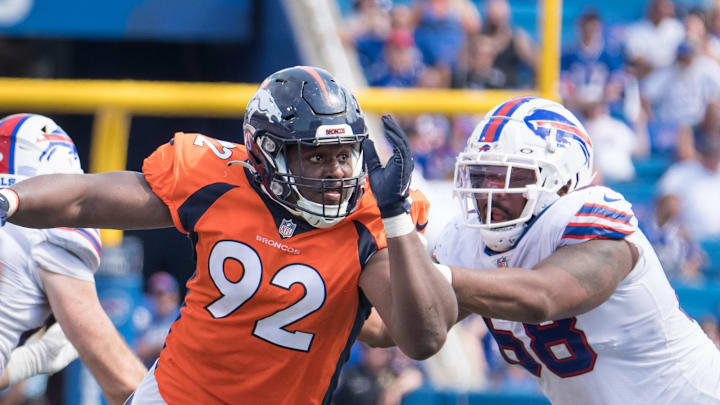 Aug 20, 2022; Orchard Park, New York, USA; Denver Broncos defensive tackle Jonathan Harris (92) with Buffalo Bills tackle Bobby Hart (68) in the third quarter of a pre-season game at Highmark Stadium. Mandatory Credit: Mark Konezny-Imagn Images