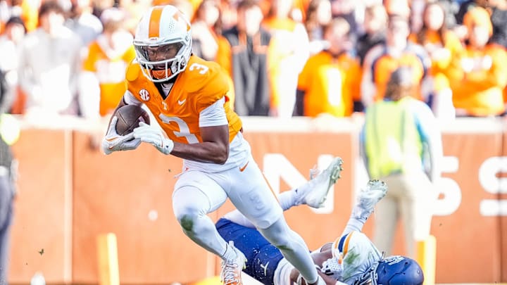 Tennessee wide receiver Squirrel White (3) escapes a tackle during a college football game between Tennessee and UTEP at Neyland Stadium in Knoxville, Tenn., Saturday, Nov. 23, 2024.