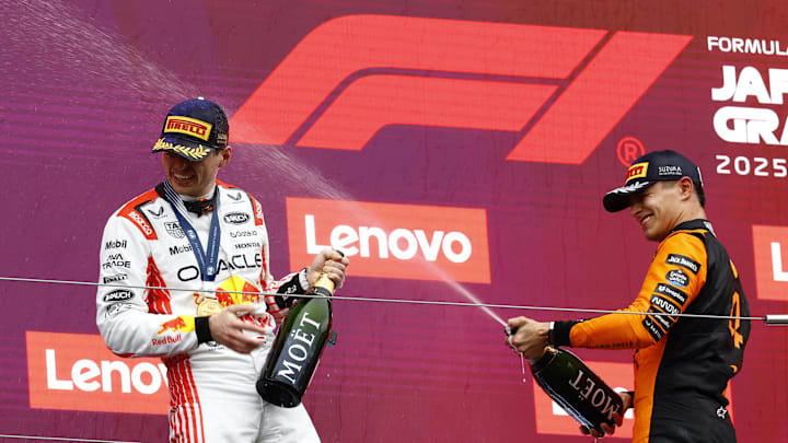 [US, Mexico & Canada customers only] April 6, 2025; Suzuka, JAPAN; Race winner Max Verstappen celebrates on the podium with second place finisher Lando Norris after the F1 Japanese Grand Prix at Suzuka Circuit. Mandatory Credit: Manami Yamada/Reuters via Imagn Images