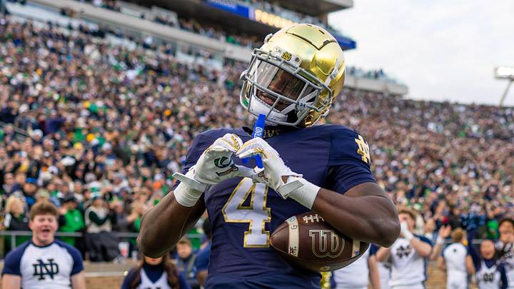 Nov 22, 2025; South Bend, Indiana, USA; Notre Dame Fighting Irish running back Jeremiyah Love (4) celebrates scoring against the Syracuse Orange during the first half at Notre Dame Stadium. Mandatory Credit: Michael Caterina-Imagn Images