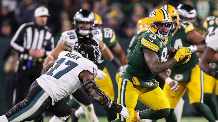 Jacobs (#8) was stonewalled for a loss of yards and a fumble on a critical fourth down play in which the Eagles seemed to know what play was coming. Jacobs (#8) was stonewalled for a loss of yards and a fumble on a critical fourth down play in which the Eagles seemed to know what play was coming.