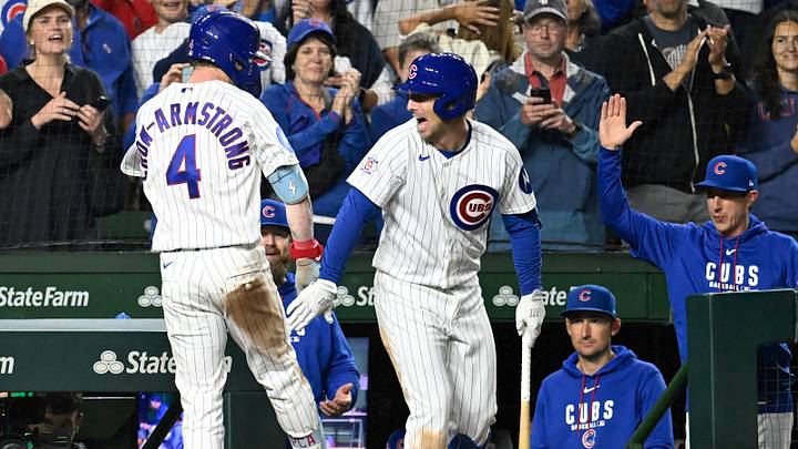 Sep 16, 2026; Chicago, Illinois, USA;  Chicago Cubs center fielder Pete Crow-Armstrong (4) high fives  third baseman Alex Bregman (3) after he hits a home run during the seventh inning against the Atlanta Braves at Wrigley Field.  Mandatory Credit: Matt Marton-Imagn Images