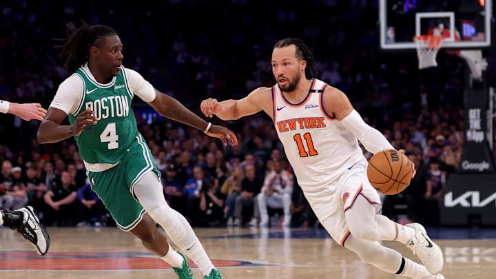 May 16, 2025; New York, New York, USA; New York Knicks guard Jalen Brunson (11) drives to the basket against Boston Celtics guard Jrue Holiday (4) during the second quarter of game six in the second round of the 2025 NBA Playoffs at Madison Square Garden. Mandatory Credit: Brad Penner-Imagn Images