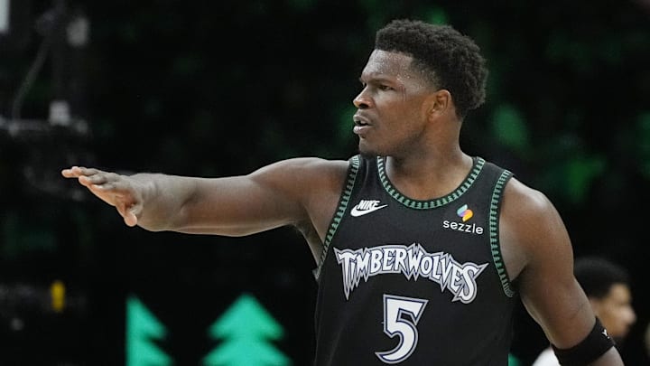 Jan 6, 2026; Minneapolis, Minnesota, USA; Minnesota Timberwolves guard Anthony Edwards (5) celebrates his team's play against the Miami Heat in the third quarter at Target Center. Mandatory Credit: Bruce Kluckhohn-Imagn Images