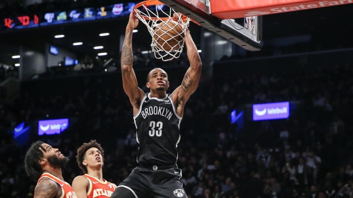 Mar 2, 2024; Brooklyn, New York, USA; Brooklyn Nets center Nic Claxton (33) dunks in the fourth quarter against the Atlanta Hawks at Barclays Center. Mandatory Credit: Wendell Cruz-USA TODAY Sports