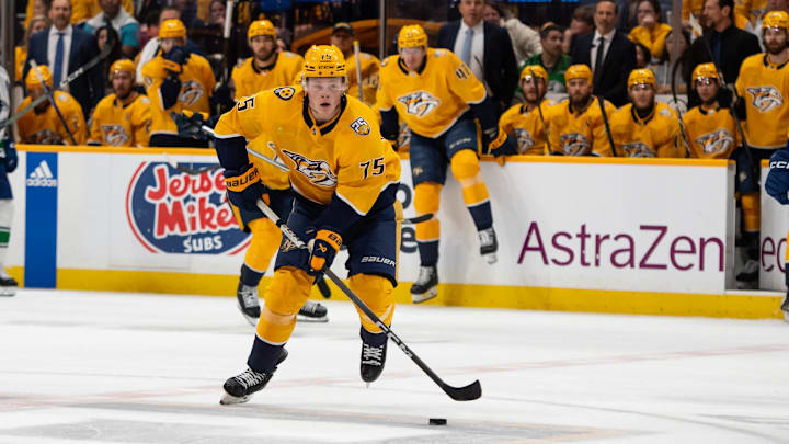 May 3, 2024; Nashville, Tennessee, USA; Nashville Predators forward Juuso Parssinen (75) skates with the puck against the Vancouver Canucks during the first period in game six of the first round of the 2024 Stanley Cup Playoffs at Bridgestone Arena. Mandatory Credit: Steve Roberts-USA TODAY Sports