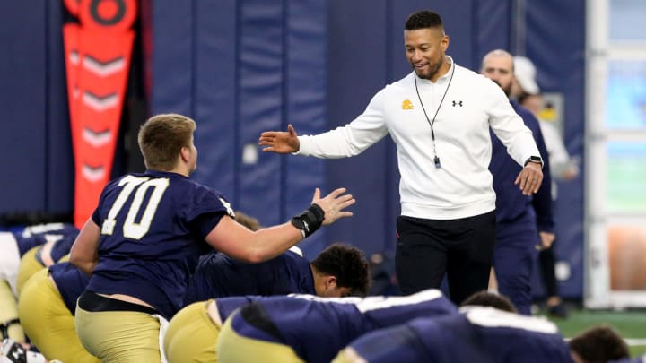 Notre Dame Head Coach Marcus Freeman greets offensive lineman Ashton Craig at Notre Dame spring football practice Thursday, March 7, 2024, at the Irish Athletics Center in South Bend. Notre Dame Head Coach Marcus Freeman greets offensive lineman Ashton Craig at Notre Dame spring football practice Thursday, March 7, 2024, at the Irish Athletics Center in South Bend.