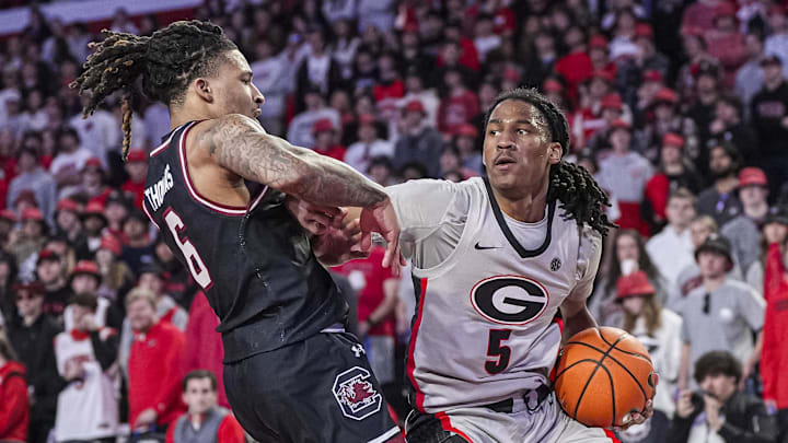 Georgia guard Silas Demary Jr. dribbles against South Carolina guard Jamarii Thomas during an SEC game this week.