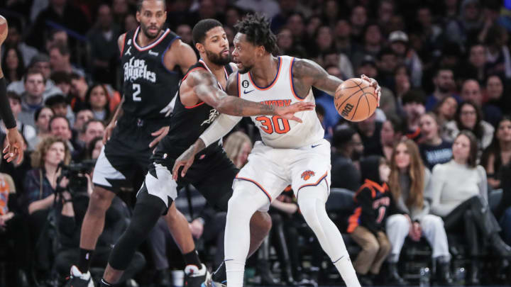 Feb 4, 2023; New York, New York, USA;  New York Knicks forward Julius Randle (30) looks to post up against LA Clippers guard Paul George (13) in the fourth quarter at Madison Square Garden. Mandatory Credit: Wendell Cruz-USA TODAY Sports