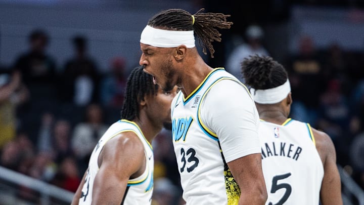 Jan 29, 2025; Indianapolis, Indiana, USA; Indiana Pacers center Myles Turner (33) celebrates a basket  in the first half against the Detroit Pistons at Gainbridge Fieldhouse. Mandatory Credit: Trevor Ruszkowski-Imagn Images