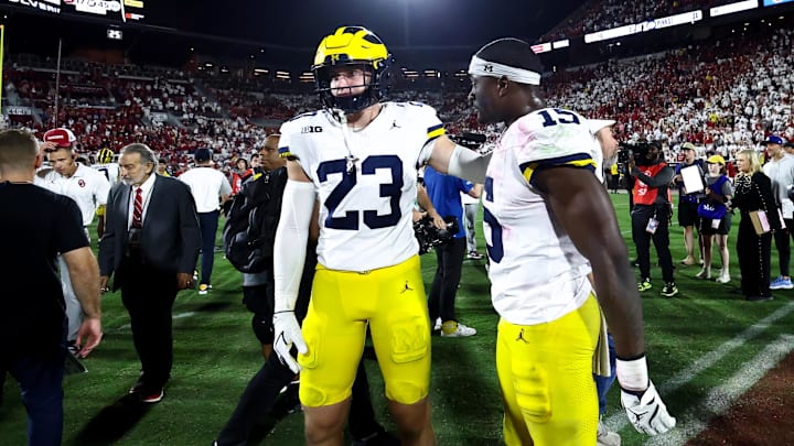 Michigan Wolverines linebacker Ernest Hausmann and linebacker Cole Sullivan after the game against the Oklahoma Sooners at Gaylord Family-Oklahoma Memorial Stadium. 