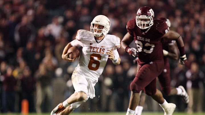 Nov 24, 2011; College Station, TX, USA; Texas Longhorns quarterback Case McCoy (6) scrambles from Texas A&M Aggies defensive lineman Tony Jerod-Eddie (83) during the second half at Kyle Field. Texas won 27-25. Mandatory Credit: Thomas Campbell-US Presswire Nov 24, 2011; College Station, TX, USA; Texas Longhorns quarterback Case McCoy (6) scrambles from Texas A&M Aggies defensive lineman Tony Jerod-Eddie (83) during the second half at Kyle Field. Texas won 27-25. Mandatory Credit: Thomas Campbell-US Presswire