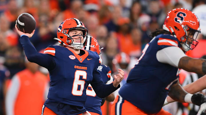 Nov 30, 2024; Syracuse, New York, USA; Syracuse Orange quarterback Kyle McCord (6) passes the ball against the Miami Hurricanes during the first half at the JMA Wireless Dome. Mandatory Credit: Rich Barnes-Imagn Images Nov 30, 2024; Syracuse, New York, USA; Syracuse Orange quarterback Kyle McCord (6) passes the ball against the Miami Hurricanes during the first half at the JMA Wireless Dome. Mandatory Credit: Rich Barnes-Imagn Images